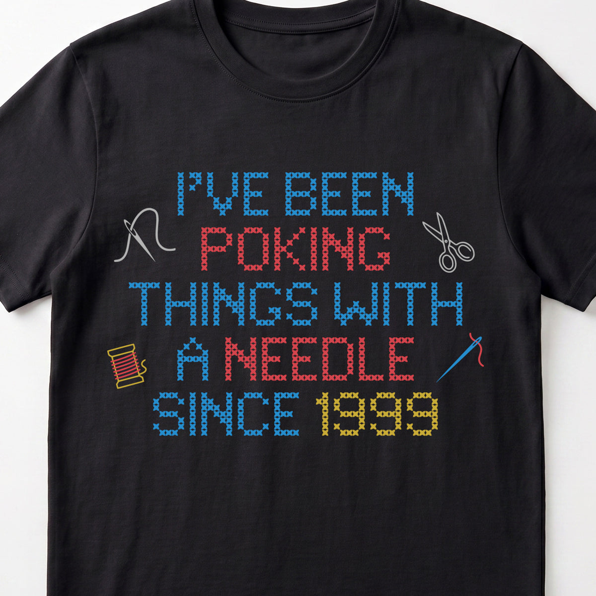 "I've been poking things with a needle since [Year]" Faux Cross Stitch T-Shirt | Custom Year