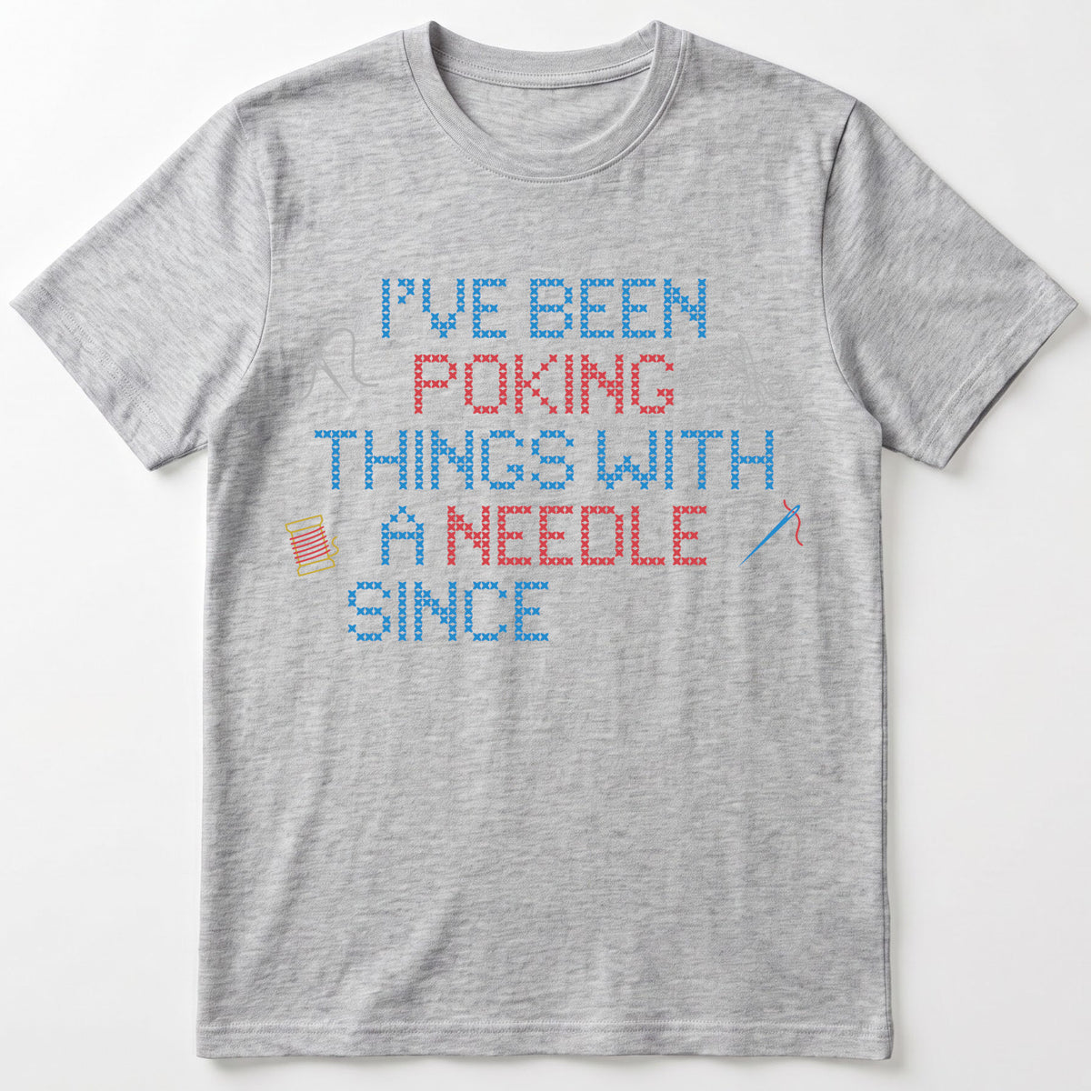 "I've been poking things with a needle since [Year]" Faux Cross Stitch T-Shirt | Custom Year