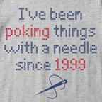 "I've been poking things with a needle since [Year]" Custom Faux Cross Stitch T-Shirt | Custom Year Tee