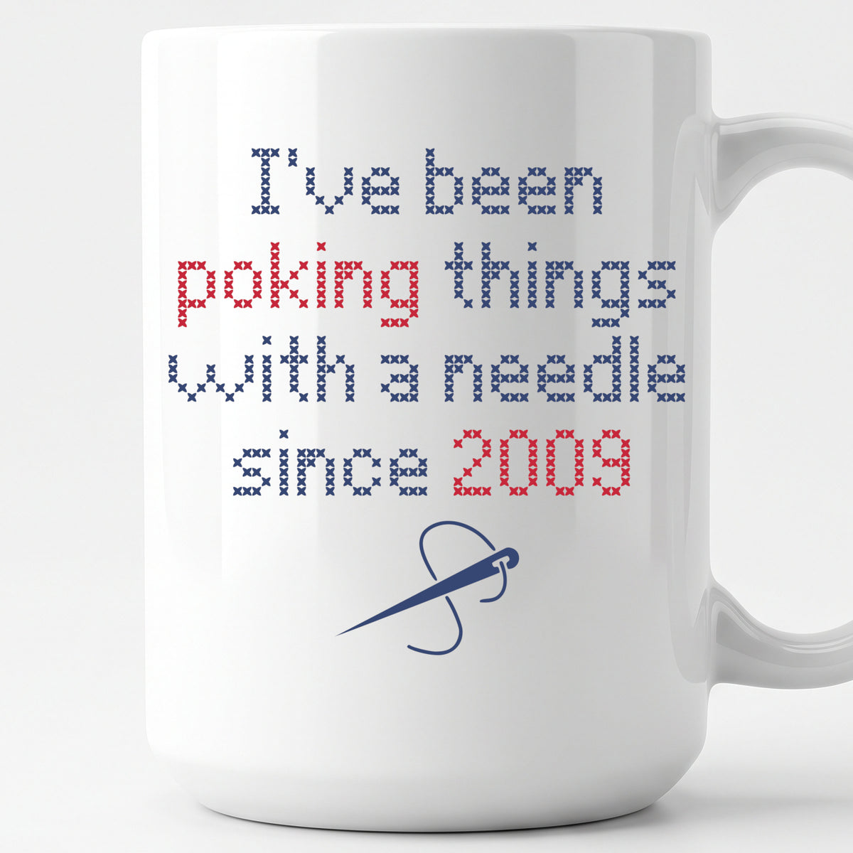 "I've been poking things with a needle since [Year]" Faux Cross Stitch Coffee Cup | Custom Year Mug