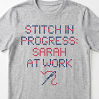 "Stitch in progress: [Name] at work" - Custom Faux Cross Stitch Tee | Personalized Name