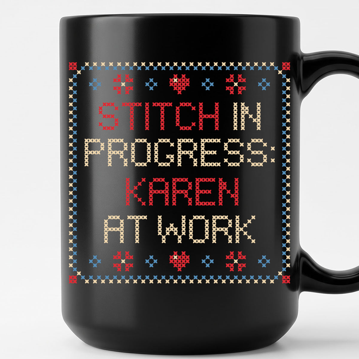 "Stitch in progress: [Name] at work" - Faux Cross Stitch Coffee Cup | Custom Name Mug
