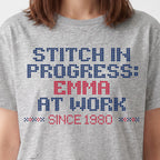 "Stitch in progress: [Name] at work. Since [Year]" - Faux Cross Stitch T-Shirt | Personalized Gift