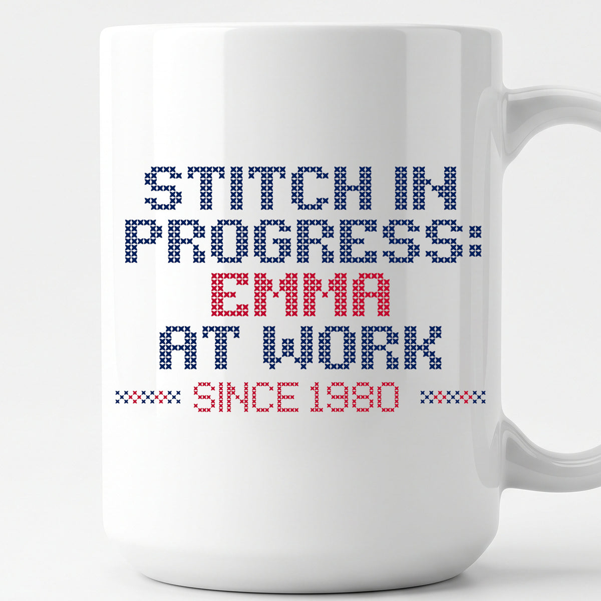 "Stitch in progress: [Name] at work. Since [Year]" - Faux Cross Stitch Mug | Personalized Gift