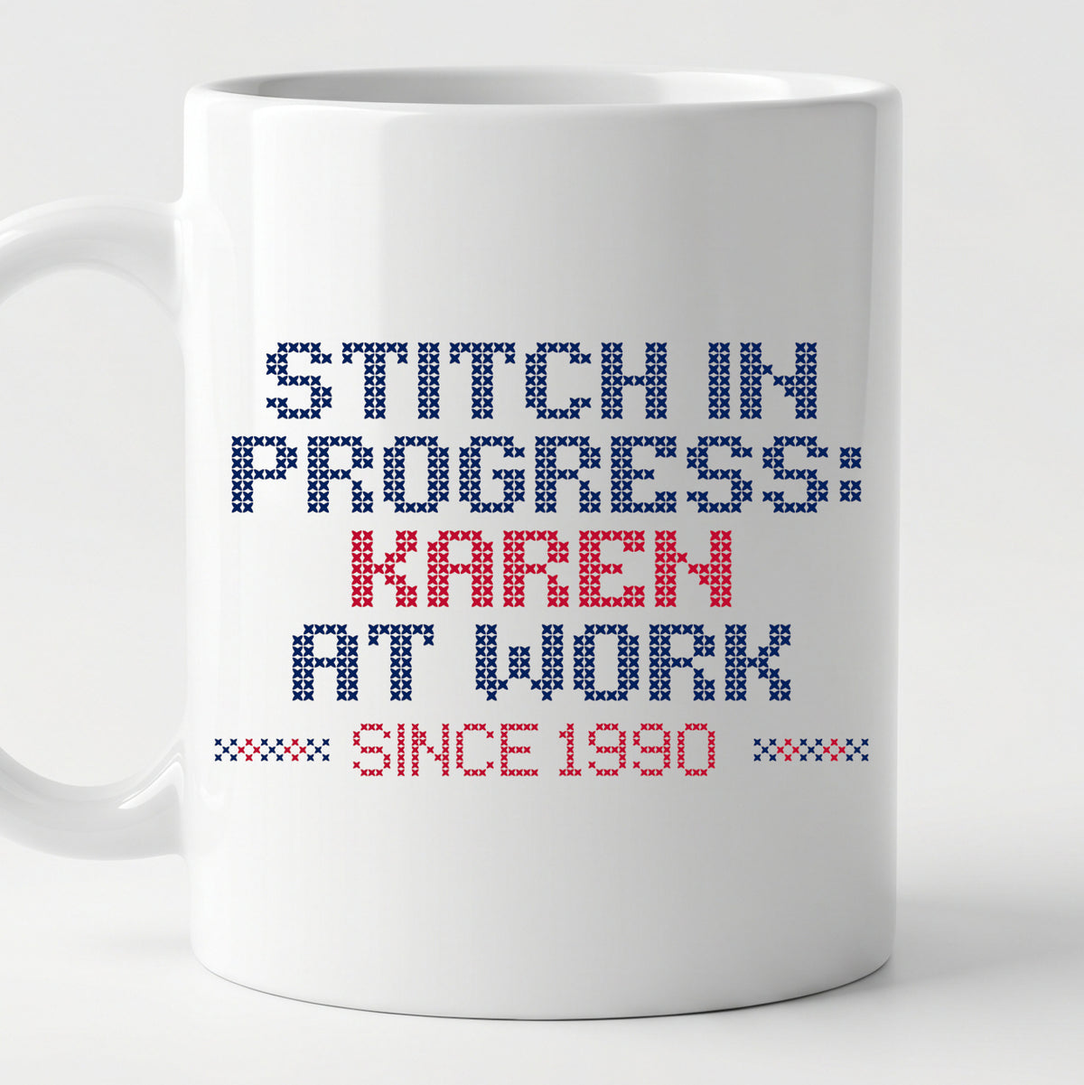 "Stitch in progress: [Name] at work. Since [Year]" - Faux Cross Stitch Mug | Personalized Gift