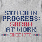 "Stitch in progress: [Name] at work. Since [Year]" - Faux Cross Stitch T-Shirt | Personalized Gift