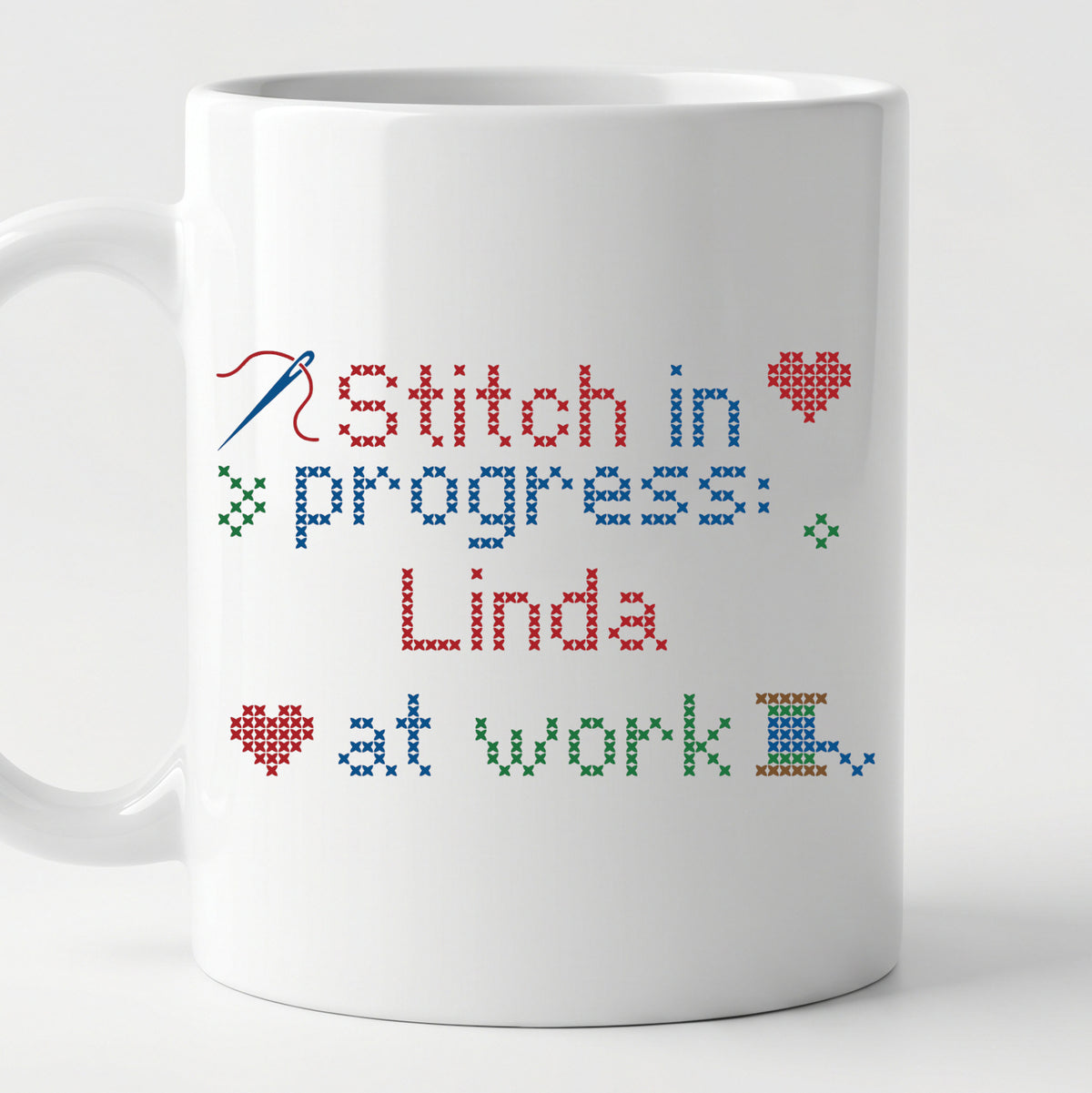 "Stitch in progress: [Name] at work" - Faux Cross Stitch Mug | Custom Name