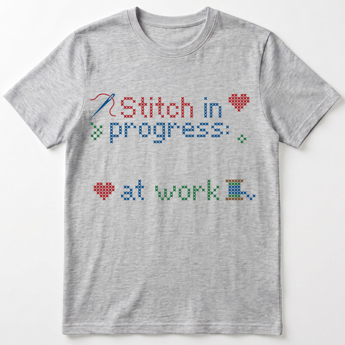 "Stitch in progress: [Name] at work" - Faux Cross Stitch T-Shirt | Custom Name