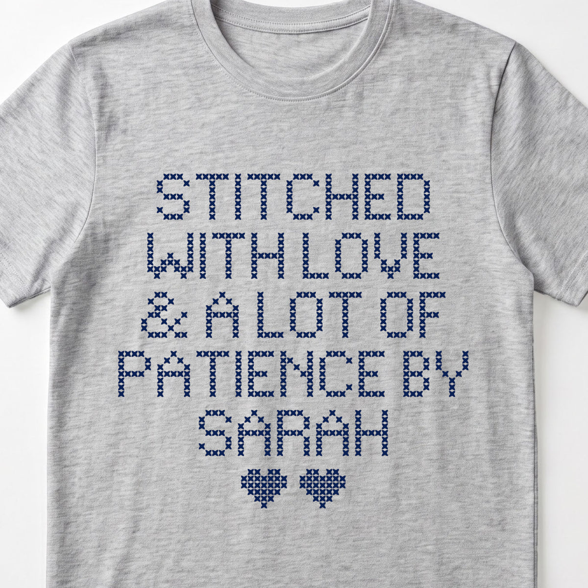 "Stitched with Love & A Lot of Patience by [Name]" Personalized Faux Cross Stitch T-Shirt | Custom Name