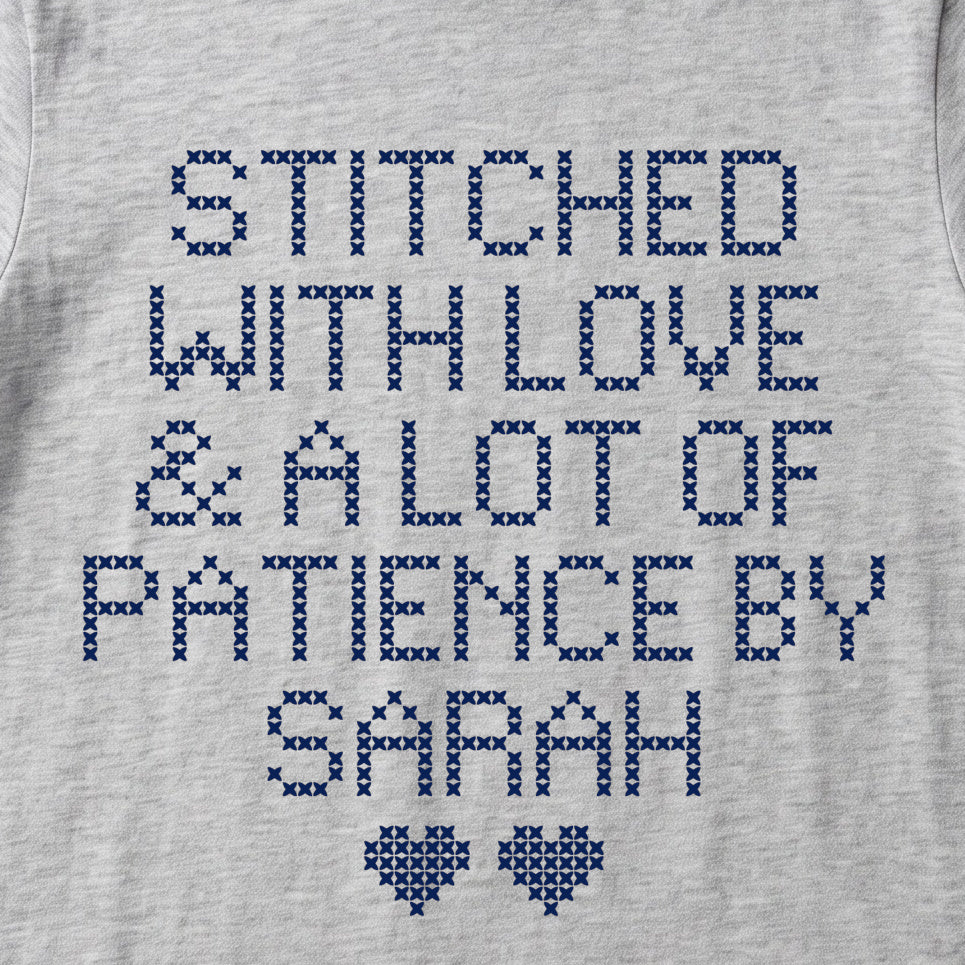 "Stitched with Love & A Lot of Patience by [Name]" Personalized Faux Cross Stitch T-Shirt | Custom Name